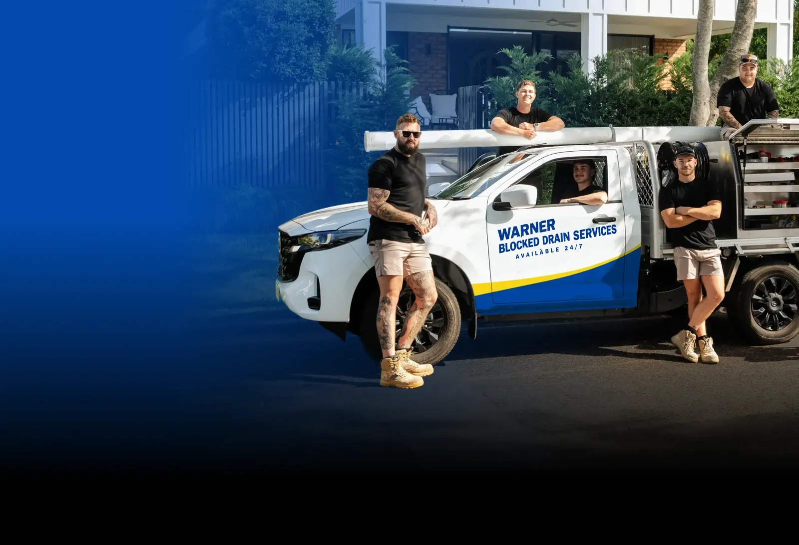 Warner Blocked Drain Services team with the ute